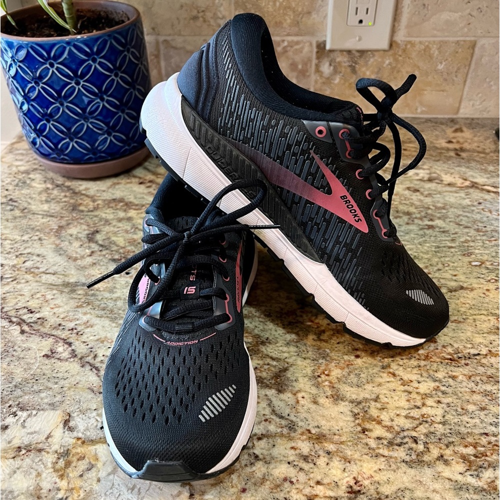Brooks Addiction Women’s running shoes. Very supportive. Worn for walking.